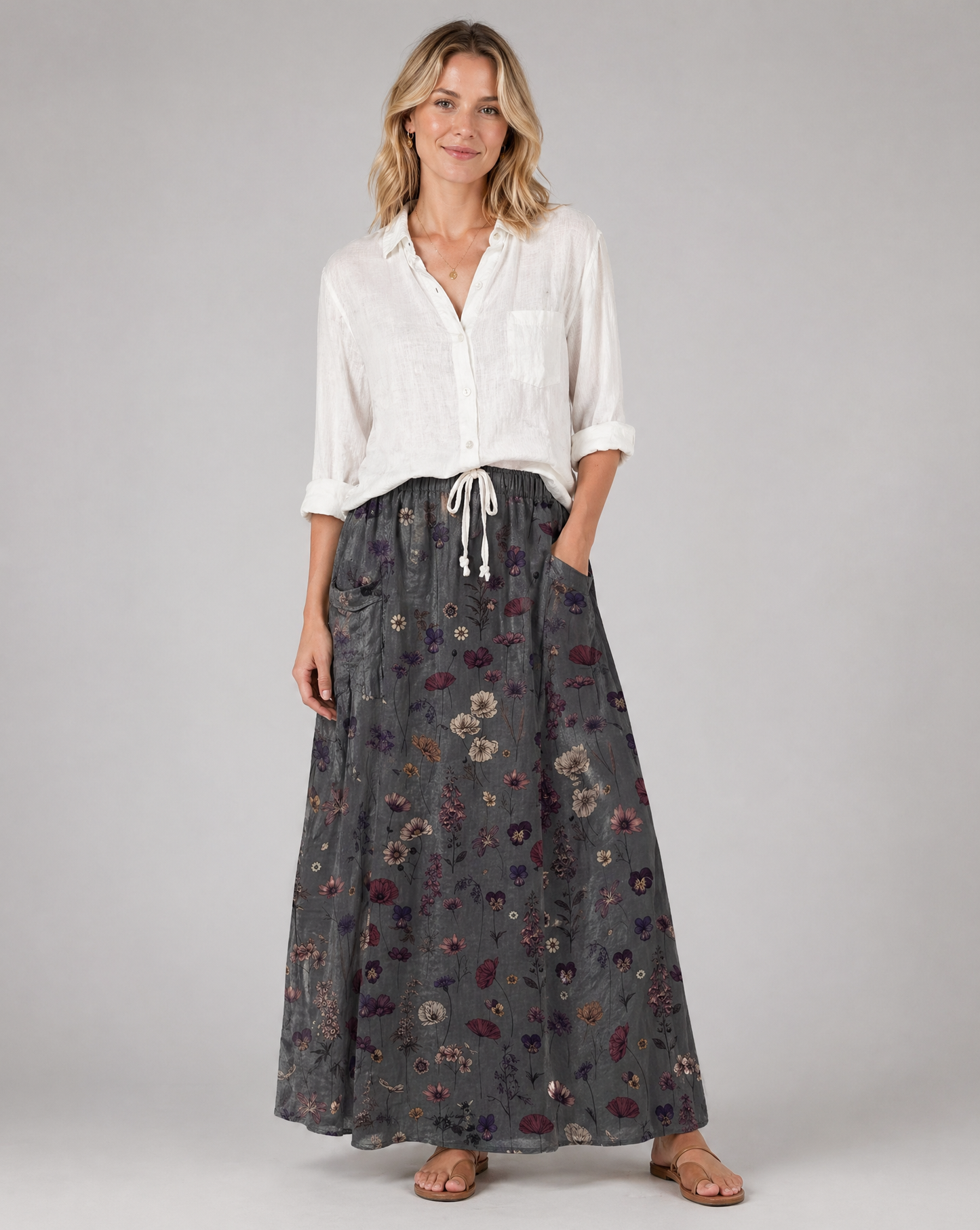 Gonna donna plissettata con stampa floreale scura e tasche
