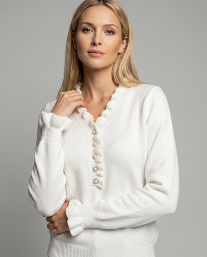 Blusa con rifiniture a volant e bottoni decorativi