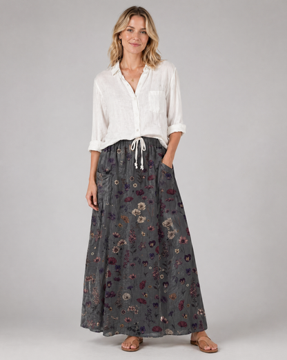 Gonna donna plissettata con stampa floreale scura e tasche