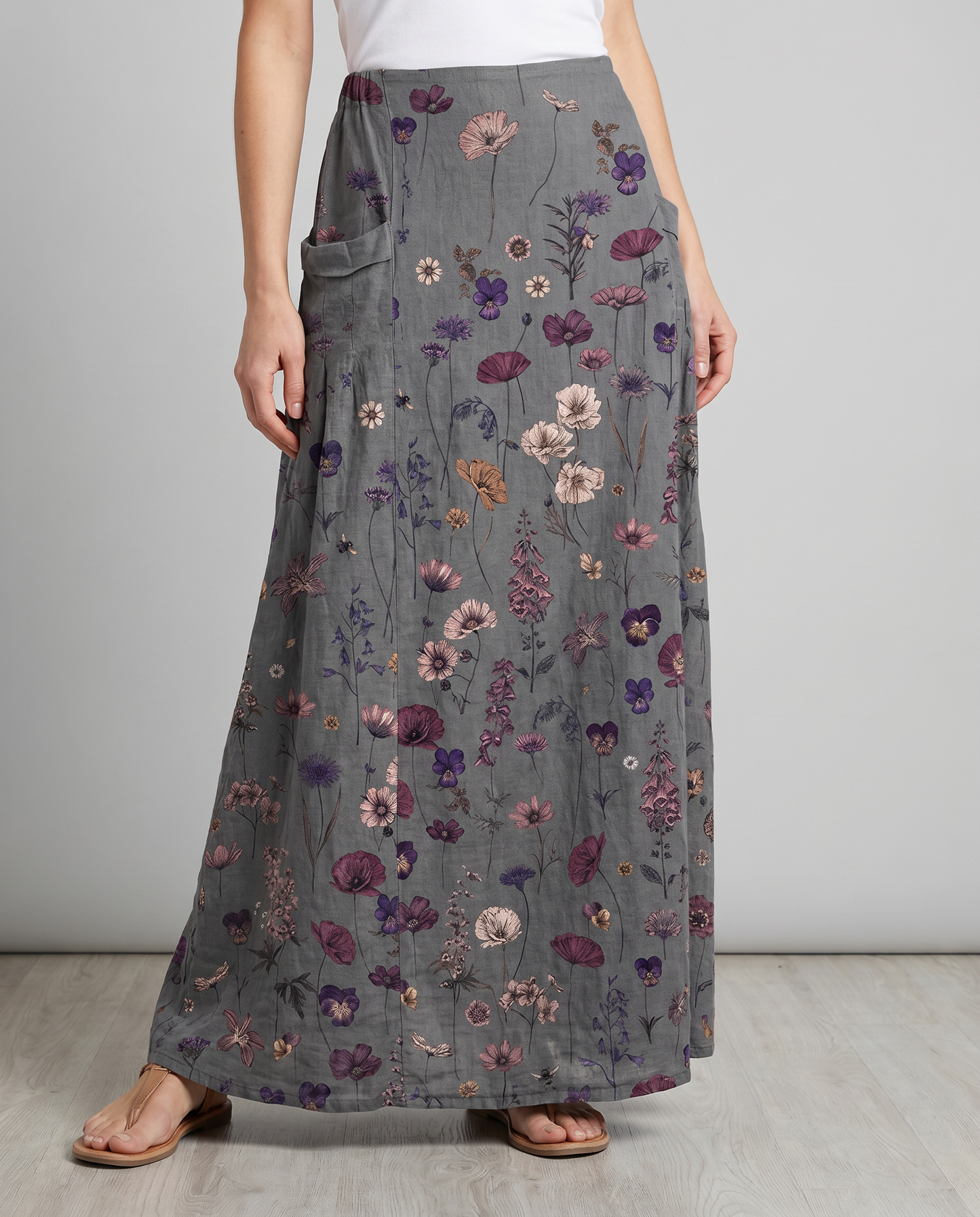 Gonna donna plissettata con stampa floreale scura e tasche
