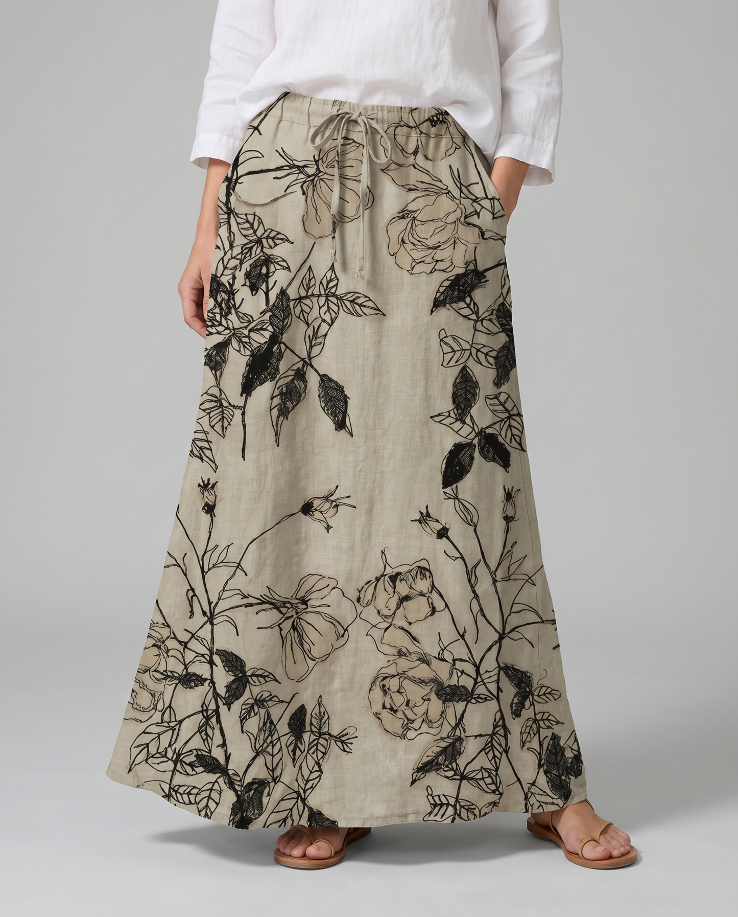 Gonna lunga kaki con stampa floreale e tasche laterali