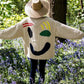 Oversized sweaters with smiley face design 6