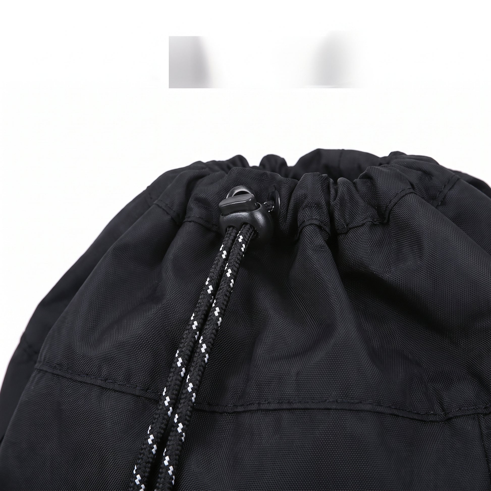 Backpack Gym Bag Drawstring Black Nylon Padded Shoulder Straps - detail