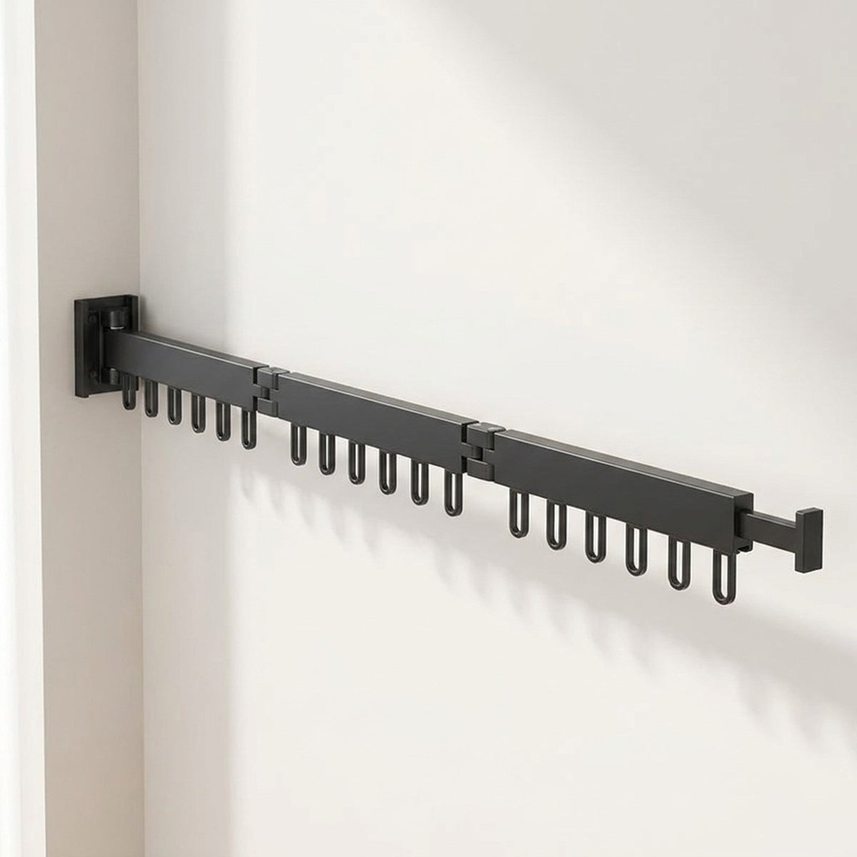 Retractable Drying Rack Folding Wall-Mount Hanger With Cloth Design Space That Disappears When You're Done - Image 1